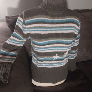 Striped Lady's Turtleneck Sweater with Embroidered Floral Detail